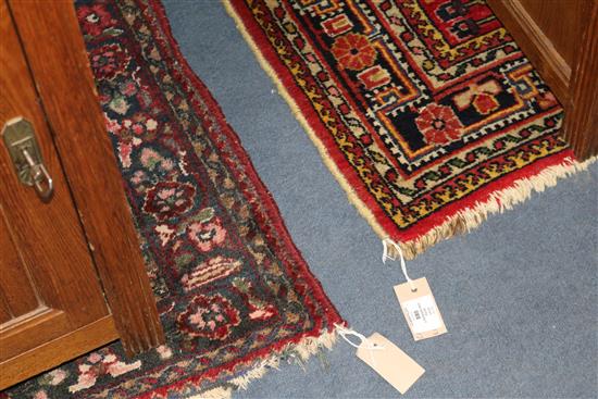 Two Persian red ground rugs W148cm x 105cm and 164cm x 105cm